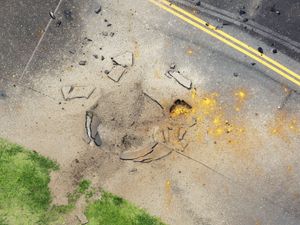 Supporting image for story: Wartime bomb explodes at Japanese airport