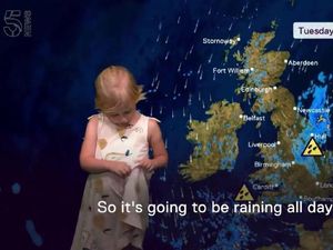 Supporting image for story: It’s safe to say this little girl is as fed up with the weather as the rest of us