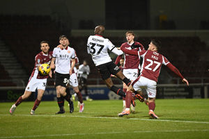 Albert Adomah heads Walsall into an early lead with his fourth goal of the season in all competitions.