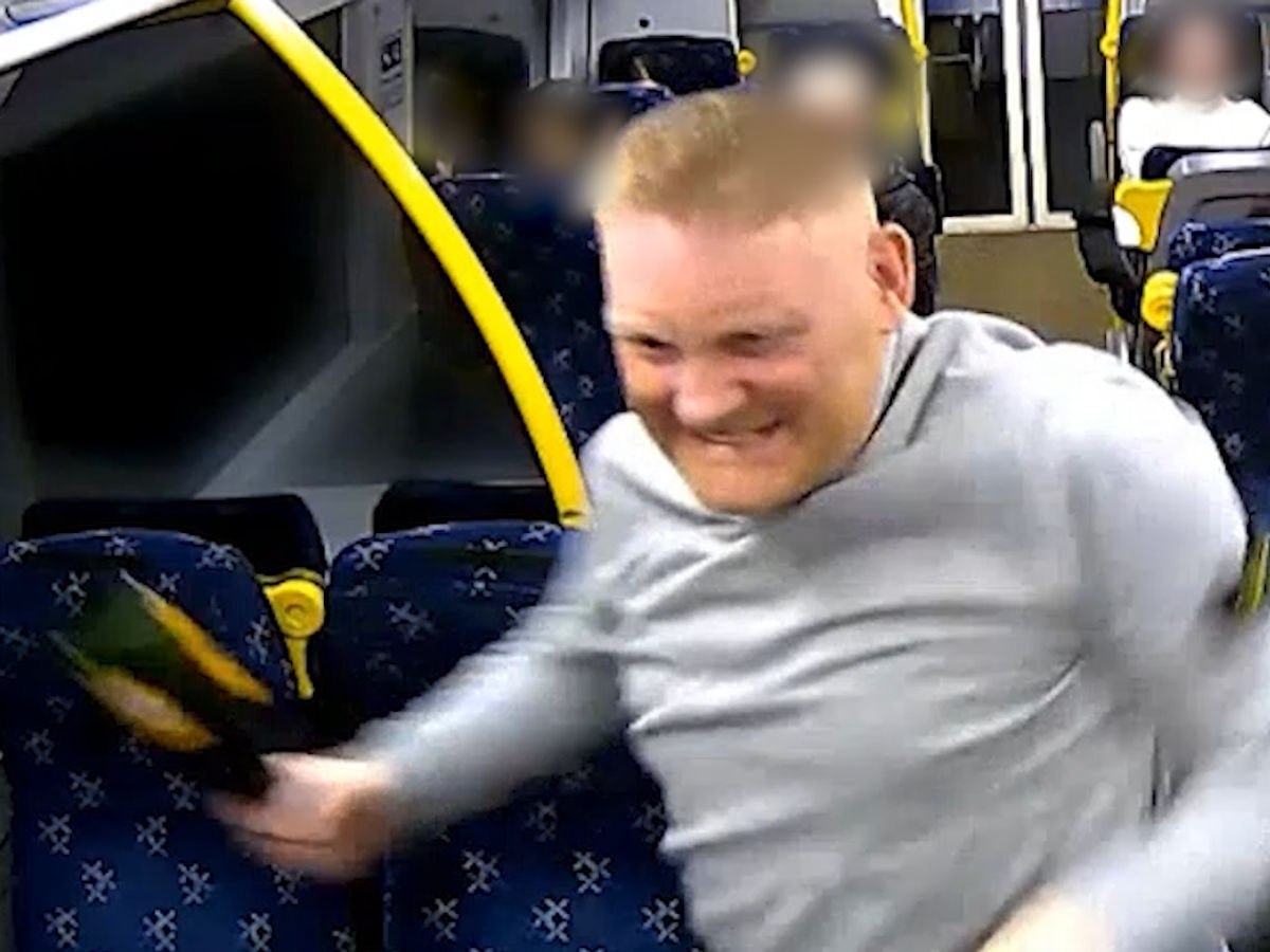Police release footage of &lsquo;relentless&rsquo; bottle attack on train