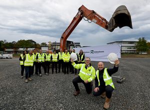 Queen mary's Grammar Head Richard Langton with Tony Farmer and the fundraising campaign board.