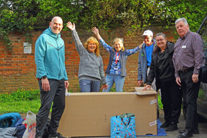 Building them own cardboard house 