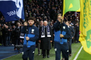 Ron Atkinson leads the former West Bromwich Albion players out for Cyrille Regis tribute. (Picture: © AMA/Adam Fradgley)


