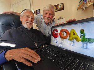Supporting image for story: Father Tom meeting his surfing web goal
