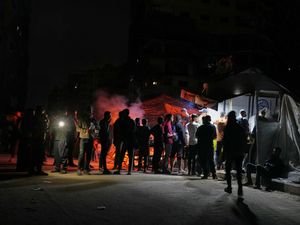 Supporting image for story: At least 34 Palestinians killed in shootings near food distribution centres