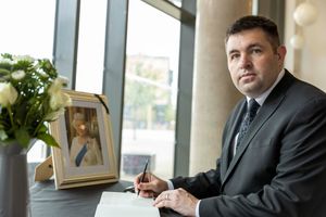 Telford & Wrekin Council leader Shaun Davies signing the book of condolence in Southwater.