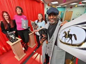 Supporting image for story: Renowned micro artist's miniature sculptures with a Peaky Blinders twist support dog rescue charity's new Black Country hub