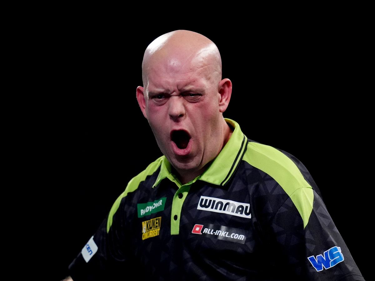 Michael van Gerwen survives scare to reach World Championship second round