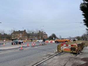 Several cars on the roundabout