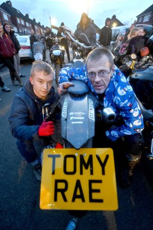 Conna Ward and Brian Sadler with Conna's bike.