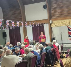 Knighton Mayor Councillor Chris Branford talks to the senior citizens