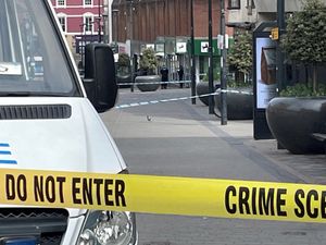 Supporting image for story: Man charged with murder after fatal stabbing inside city centre bank