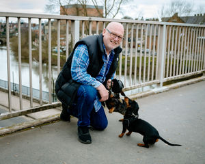 Martin Palmer, manager of Hotel Chocolat in Pride Hill, with his dogs Luna and Dottie