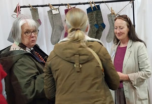 Helen Hickman (right) from Nellie and Eve busy on her stand at Wonderwool Wales