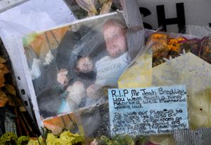 A large number of tributes for Joshua Bradley lie at the scene of a fatal car accident at the entrance to Cannock Chase Crematorium