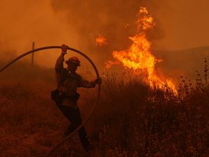 Supporting image for story: Fire crews make progress against blaze that forced thousands to flee north of LA