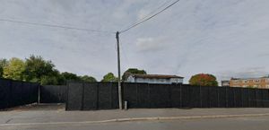 The fenced-off and dilapidated Perry Hill Tavern which will be demolished after plans were backed by Sandwell Council. Pic: Google Maps. Permission for reuse for all LDRS partners.