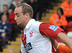 Kidderminster Harriers striker Robbie Matthews will start a three-match suspension when Crawley come to Aggborough.