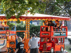 Children enjoy fairground rides Credit: Ian Knight / Z70 Photography