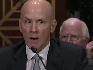 Supporting image for story: Someone dressed as the Monopoly man and photobombed the Equifax hearing