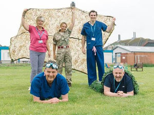 Supporting image for story: Assault course challenge in hospital grounds
