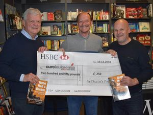 Supporting image for story: Wolves book spurs charity donation