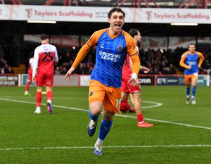 Iwan Morgan celebrates scoring inside the opening 30 seconds. Picture: Tim Thursfield