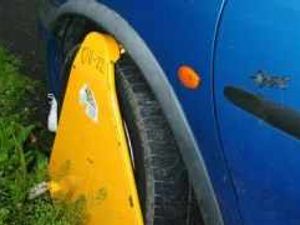 Supporting image for story: DVLA fines clamped residents