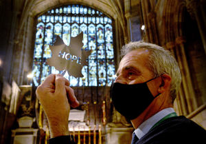Verger Chris Craddock, viewing part of the installation