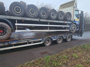 Supporting image for story: Police share image of 'shocking' load after lorry carrying another lorry stopped 
