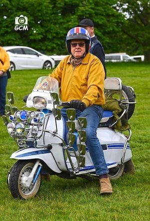 Members of The Faces Scooter Collective ride machines ranging from the 1960s to the present day.