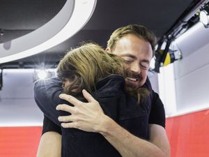 Jamie Theakston being hugged by Davina McCall on his return to Heart Breakfast