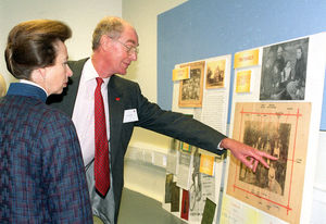 Showing Princess Anne a display highlighting the Jebb family link to Save The Children.