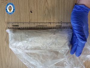 A bag containing some of the heroin found.