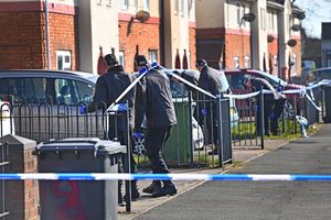 Police remained at the scene following the shooting