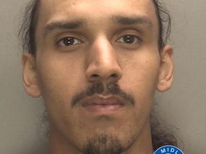 Supporting image for story: Watch: See the moment gunman jailed for 24 years is discovered by police on rooftops in Wolverhampton