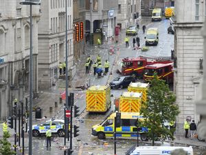 Supporting image for story: Four children among injured after car ploughs into Liverpool parade crowd