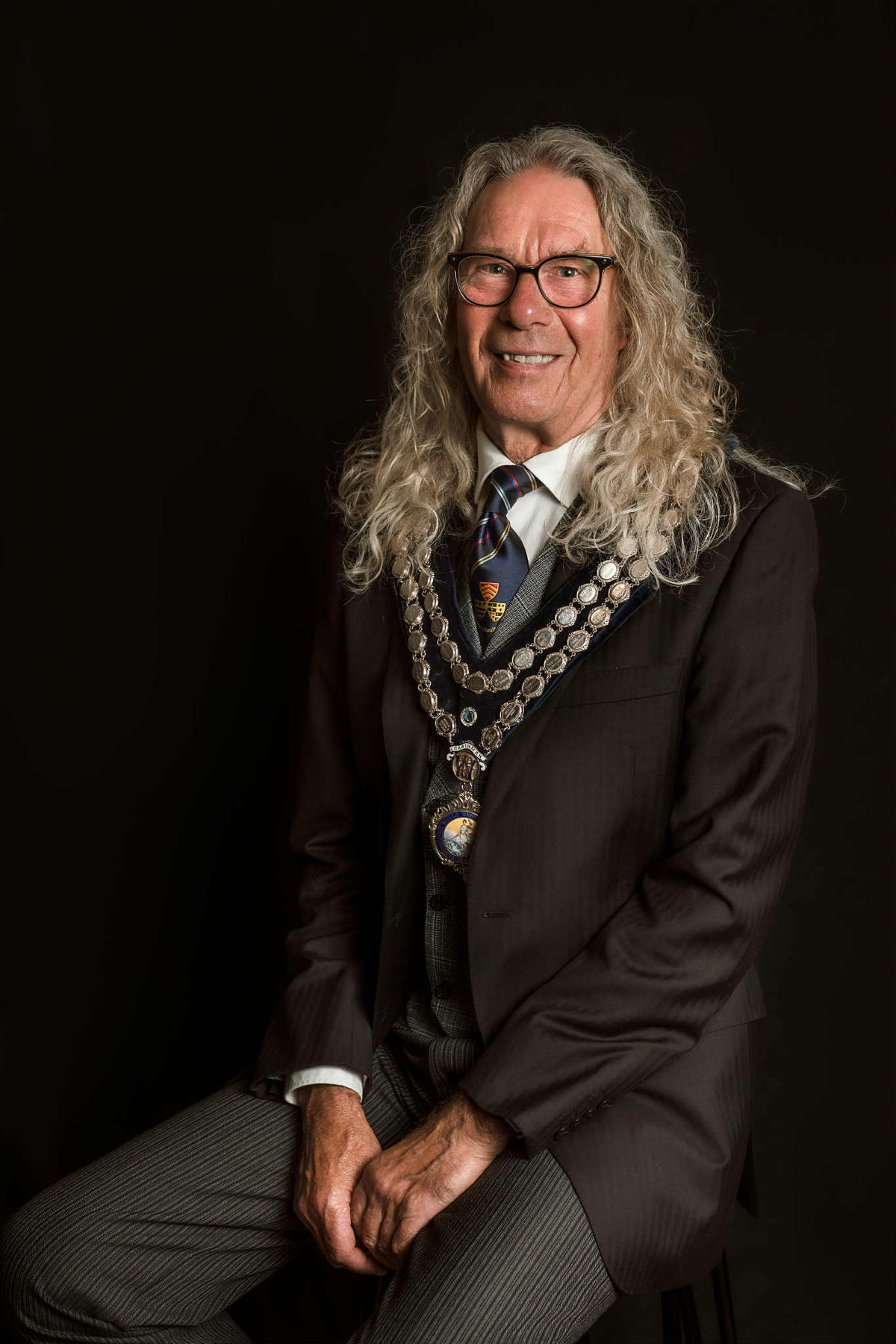 Welsh Government should try to impress the Welsh instead of the rest of the world in last few months before election, Powys mayor says