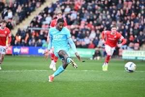 Daniel Kanu was denied from the spot by Ian Lawlor in the first half.