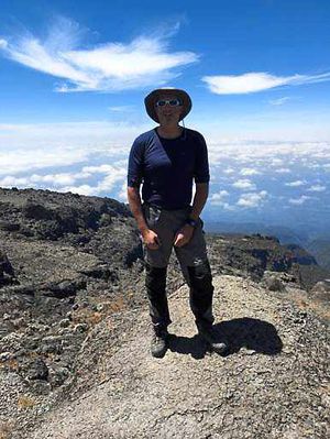 Pub landlord Neil Taylor relaxes at 15,000 feet near the mountain top