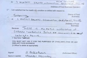 A notice placed in the window of Subway