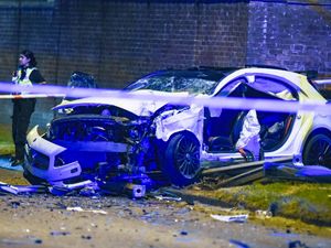 Supporting image for story: Driver flees as three injured and car wrecked in bus stop crash