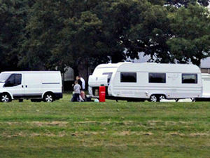 Supporting image for story: Travellers set up camp on Aston university's pitches