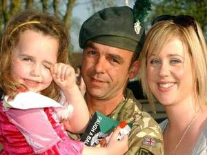 Supporting image for story: Friends and family gather to greet Royal Irish heroes
