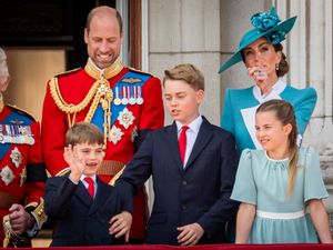 Supporting image for story: Royal decorum: George calms exuberant brother Louis during Trooping flypast