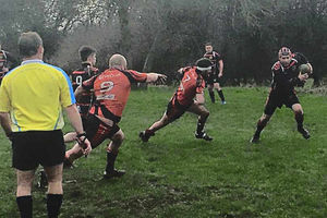 Oswestry's Hamish Fuller and Zac Baldwin move up in defence against Marple.