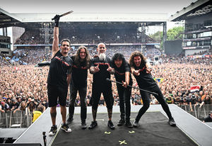 Members of US rock band Anthrax, pose for a photo after playing as a support act