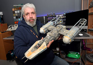 Guy with one of the in-progress 'Bill George Y-Wing' models