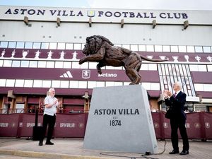Dennis Mortimer and Brian Little unveil the statue.