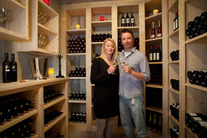Come wine with me – the couple in the chalet's wine cellar